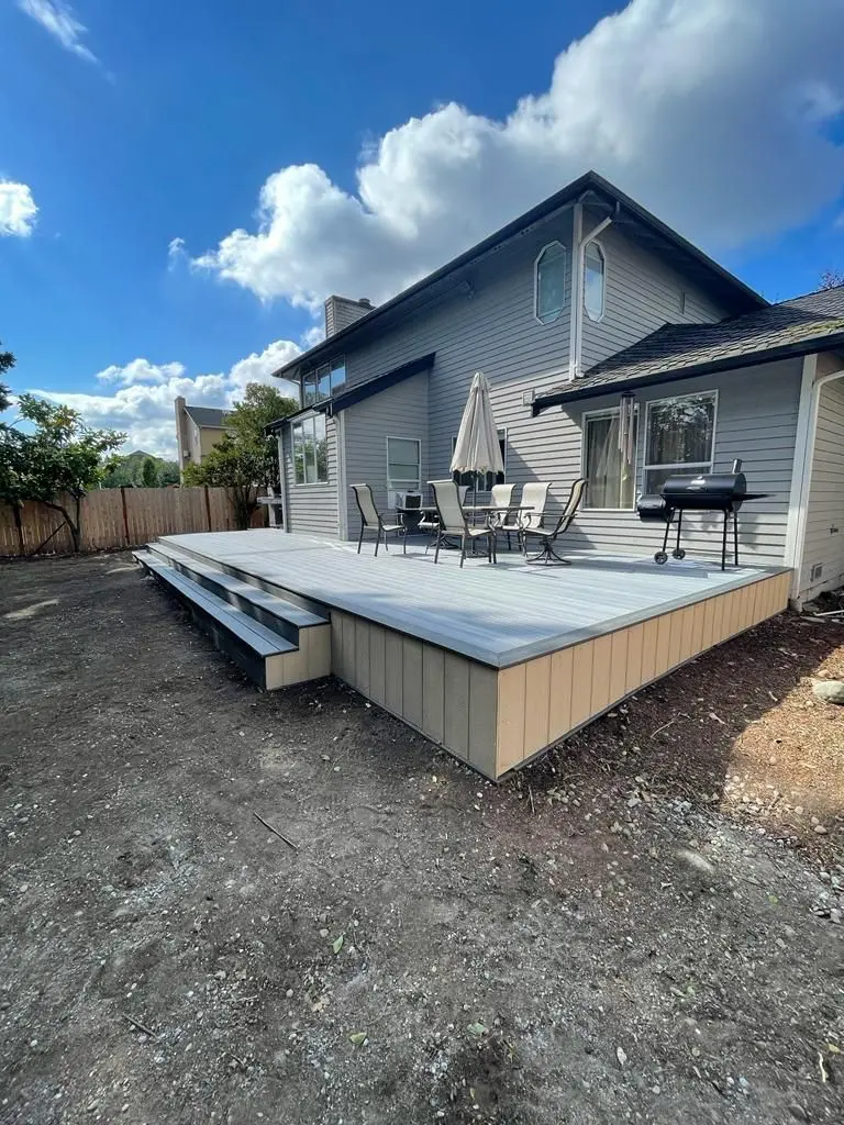 Deck Builder in Everett installing durable composite decking in Silver Lake Everett backyard