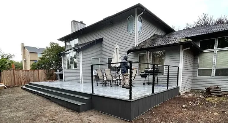 Custom backyard Deck Installation with modern layout and seating area