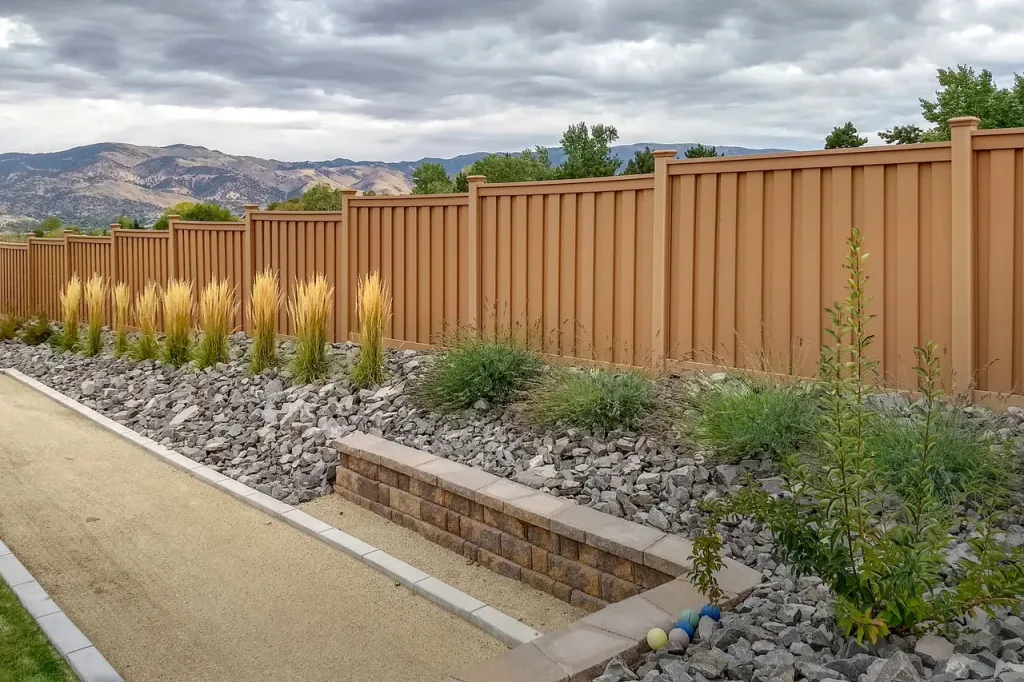 Professional Fence Contractor installing durable custom wood fence