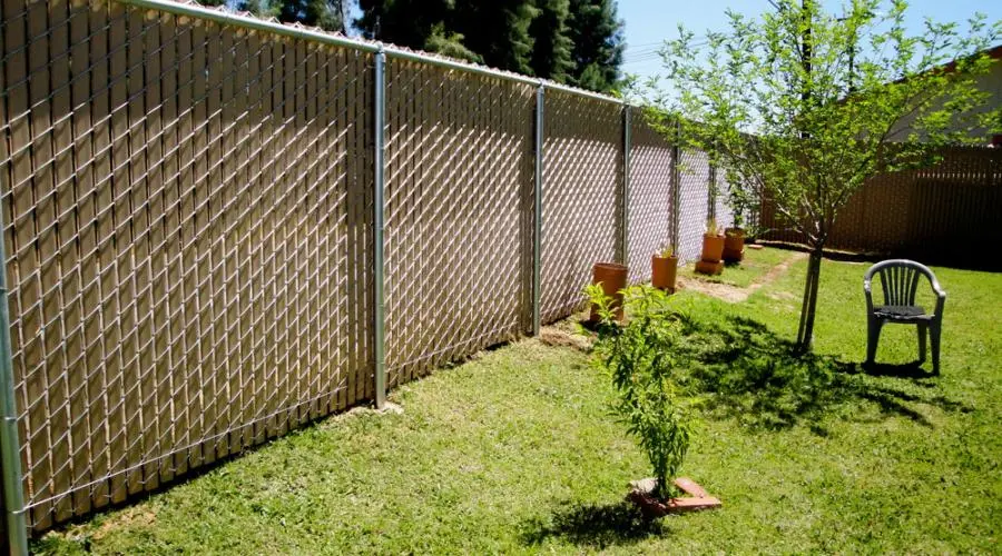 Evergreen Deck & Fence Company constructing strong metal fencing for long-term durability